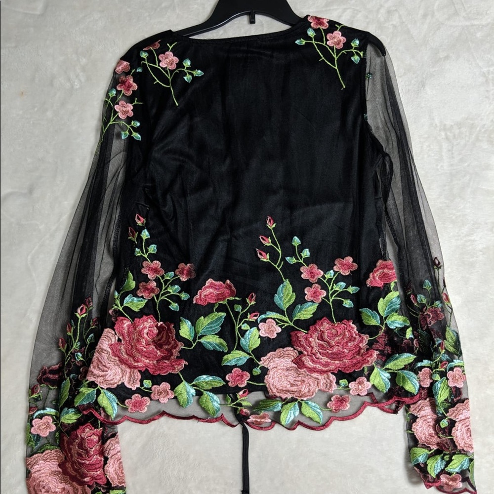 VENUS, black sheer blouse, floral design. Used